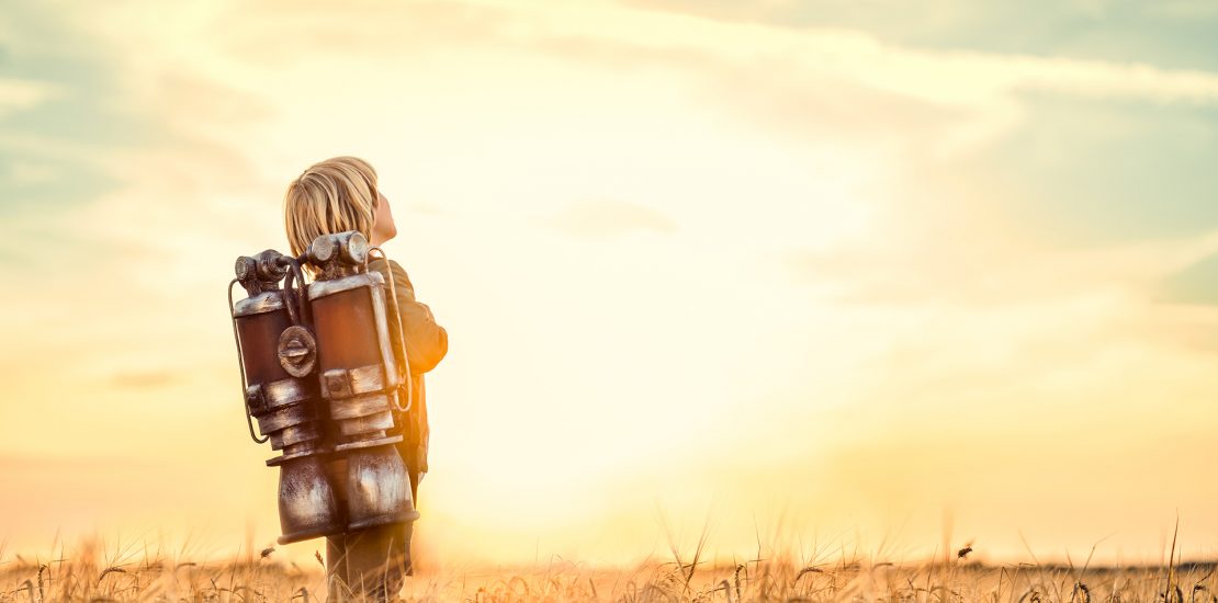 Dreaming child in a wheat field